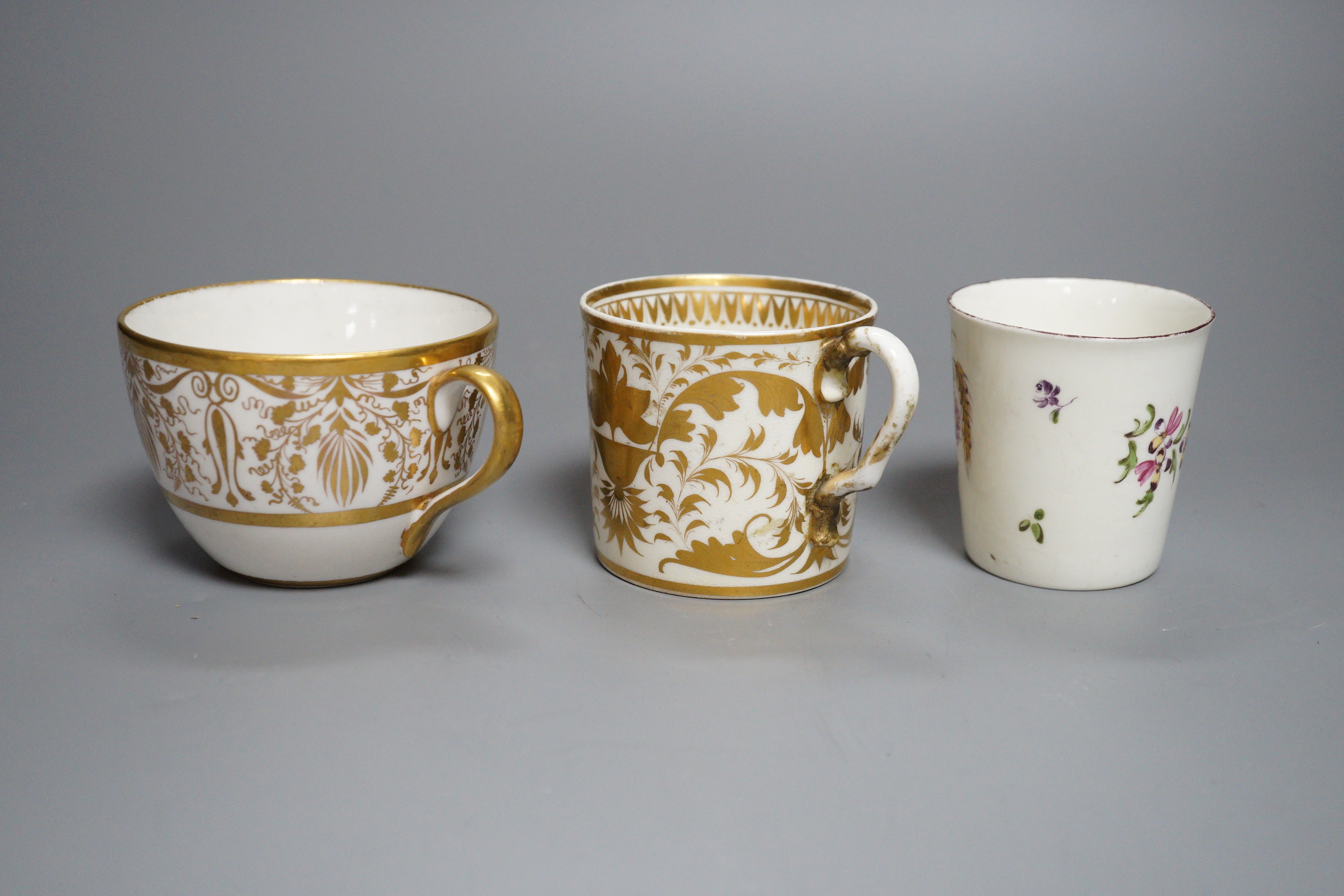 An 18th century miniature porcelain tumbler, probably Derby, a Derby coffee can and a Bute-shape coffee cup